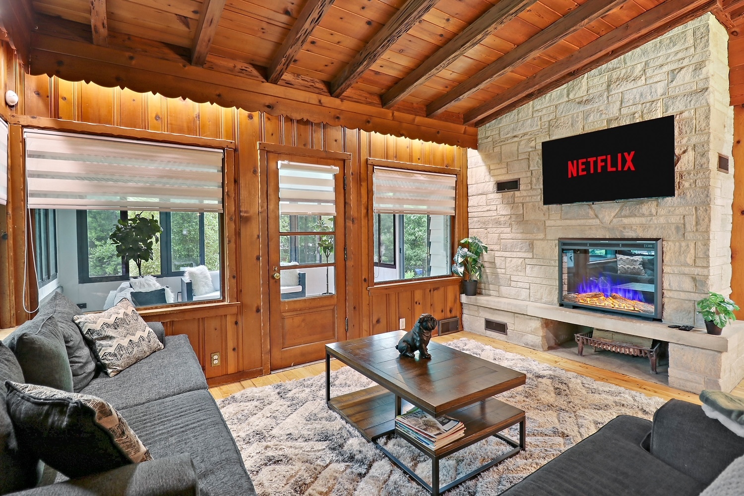 2618 Apache Trail McHenry, IL 60051 - Photo 7 of 34 a living room with furniture a flat screen tv and a fireplace