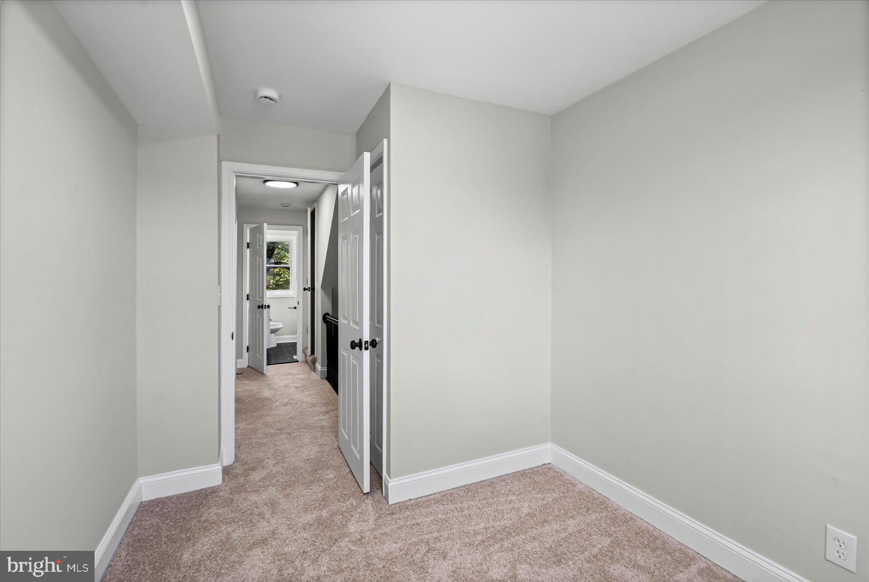 1812 Ingram Road Baltimore, MD 21239 - Photo 20 of 45 an empty room with mirror