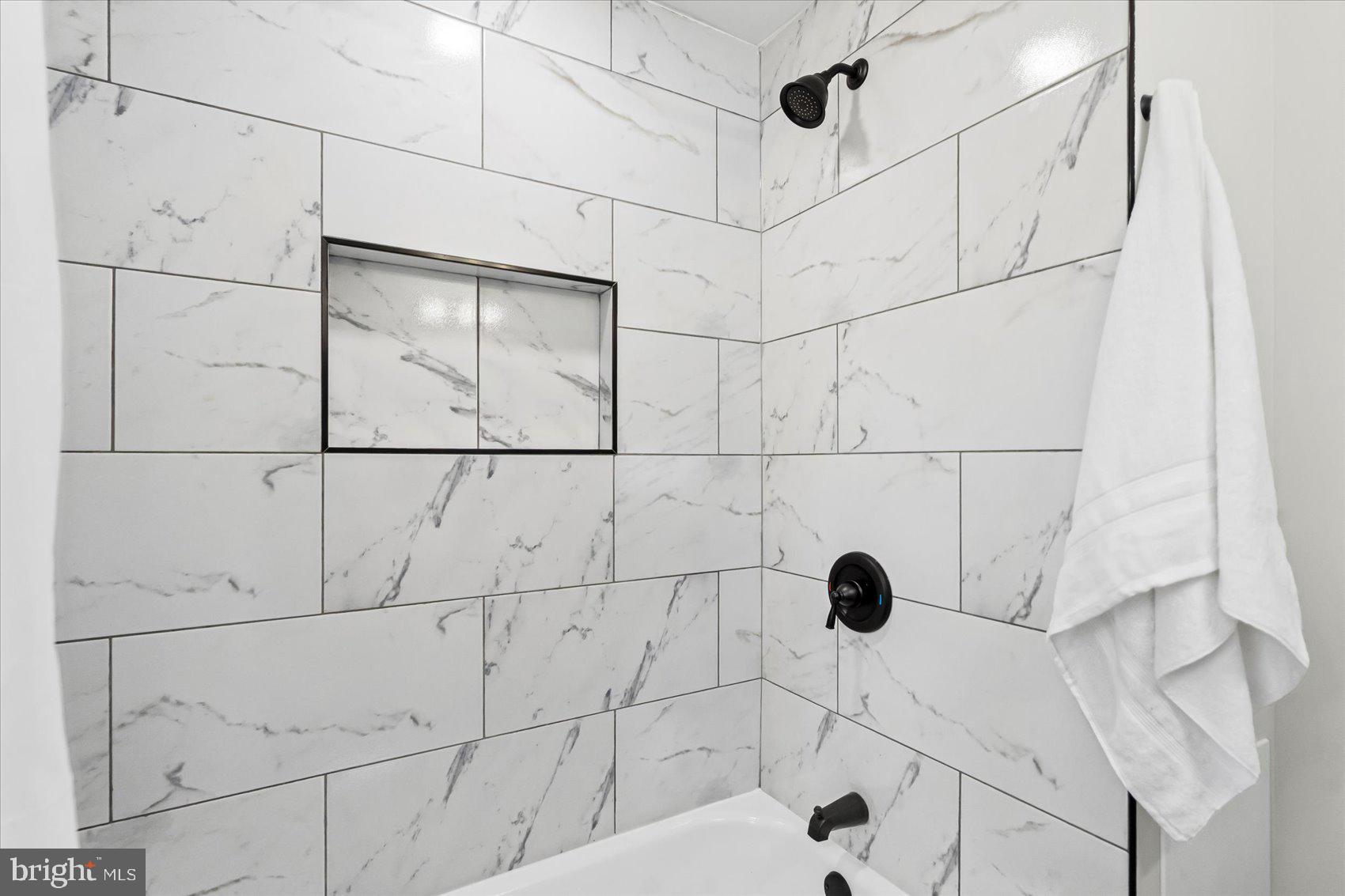 1812 Ingram Road Baltimore, MD 21239 - Photo 26 of 45 a bathroom with a shower