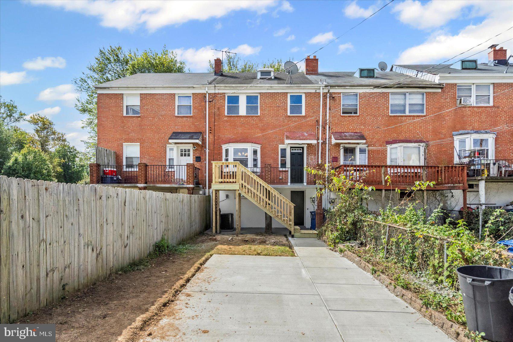 1812 Ingram Road Baltimore, MD 21239 - Photo 39 of 45 front view of a house with a yard