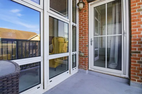 a view of an entryway with a door