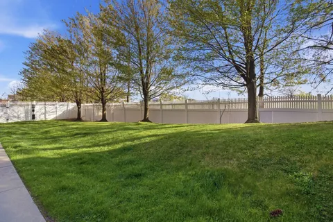 a view of open space with garden