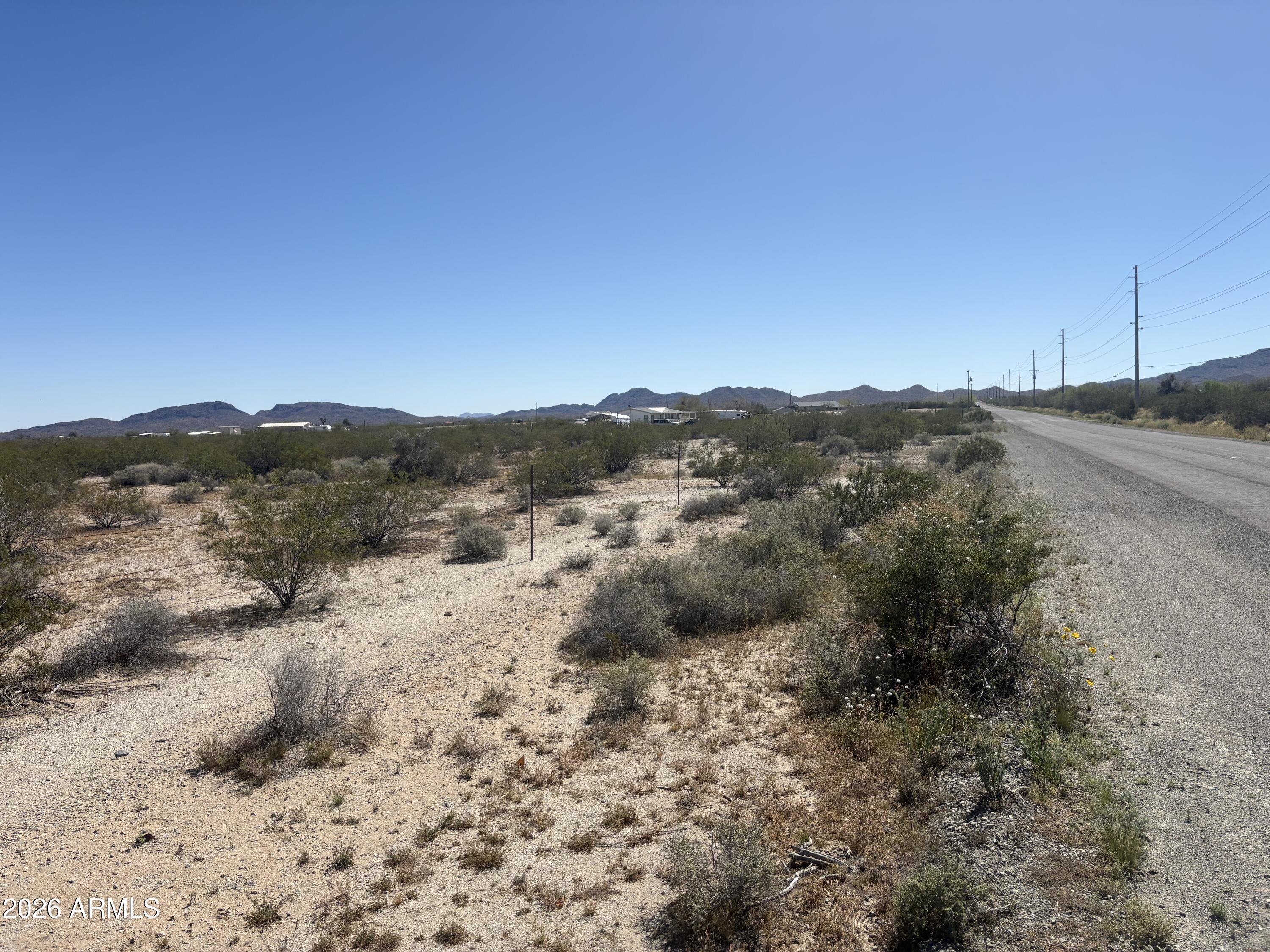 68125 Simcox Road Salome, AZ 85348 - Photo 14 of 18 a view of a dry yard with trees
