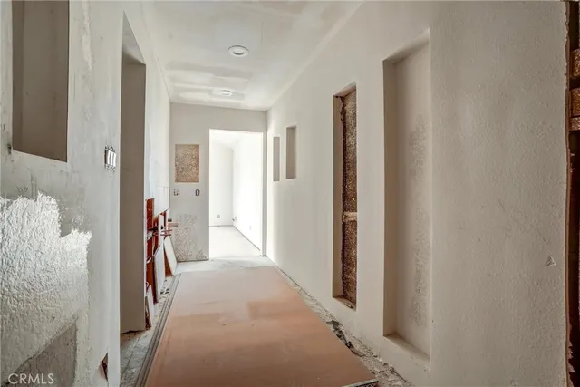 a balcony view with a backyard space