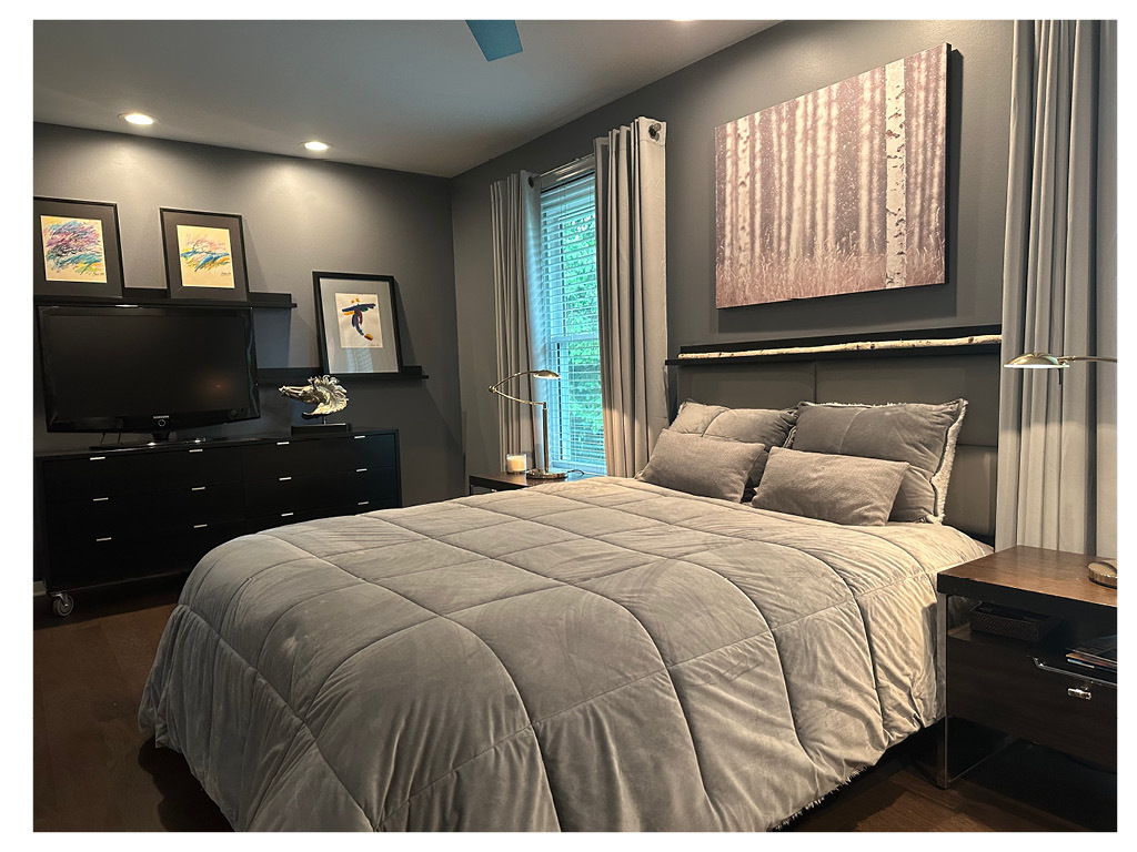 129 Regency Drive Lombard, IL 60148 - Photo 33 of 58 a bedroom with a bed and a flat tv screen