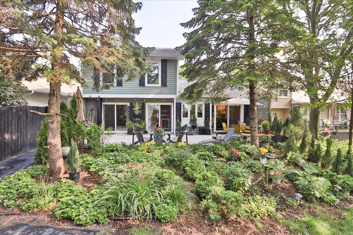129 Regency Drive Lombard, IL 60148 - Photo 42 of 58 a front view of a house with swimming pool