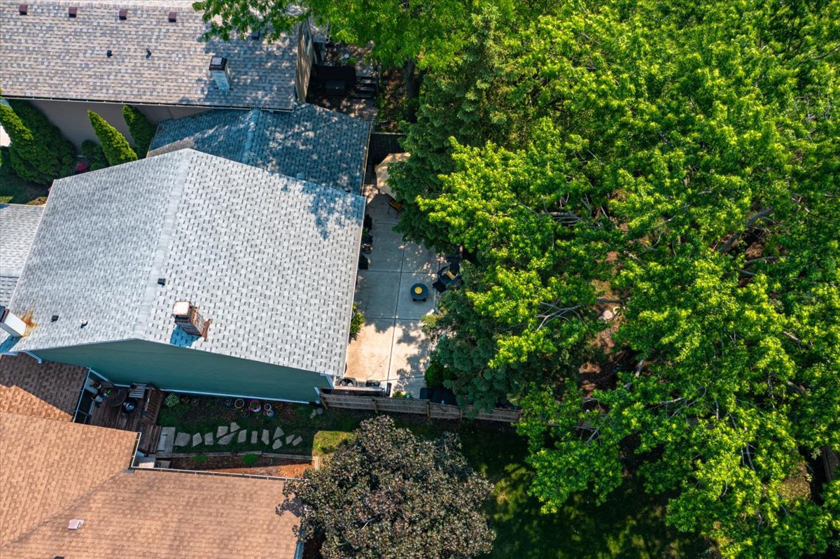 129 Regency Drive Lombard, IL 60148 - Photo 50 of 58 an outdoor space with plants and umbrella