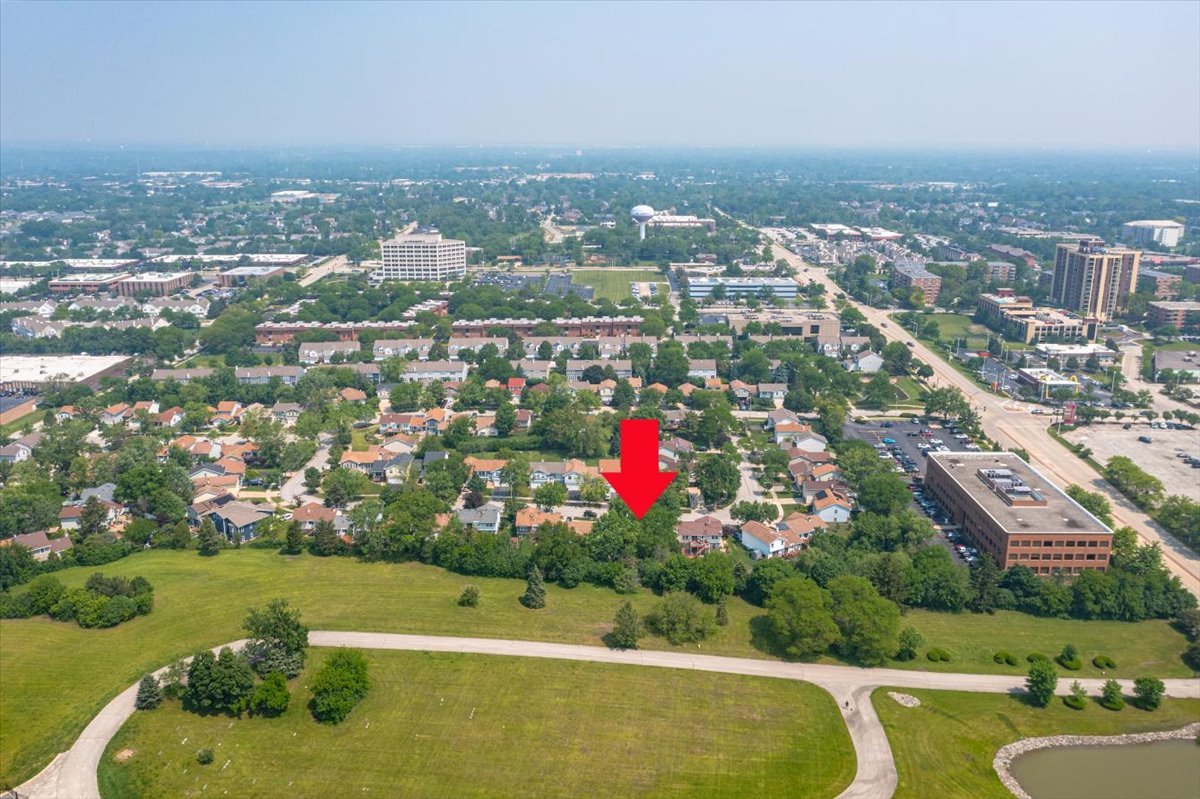 129 Regency Drive Lombard, IL 60148 - Photo 55 of 58 an aerial view of residential houses with outdoor space and swimming pool