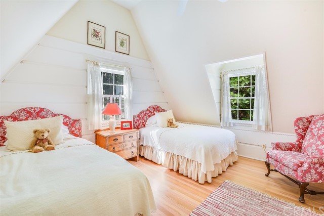 167 Cedar Circle Lake Arrowhead, CA 92352 - Photo 12 of 38 a bedroom with two beds and a window