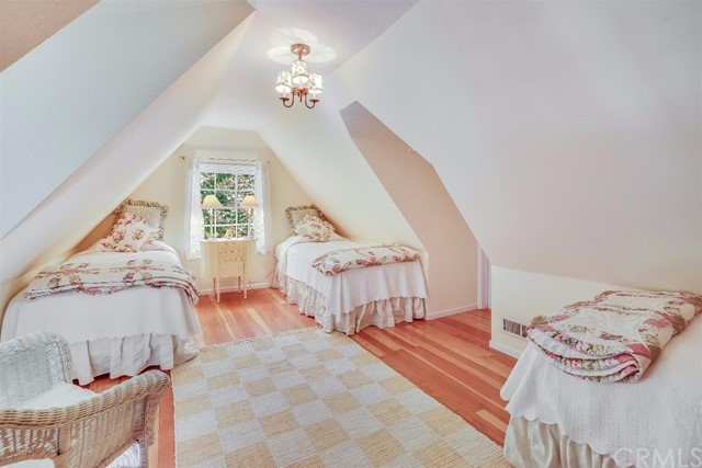 167 Cedar Circle Lake Arrowhead, CA 92352 - Photo 20 of 38 a bedroom with furniture and a window