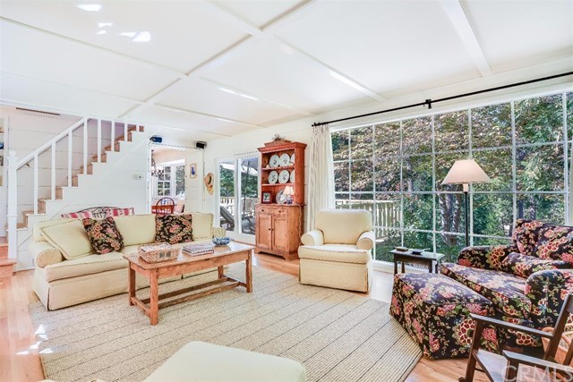 167 Cedar Circle Lake Arrowhead, CA 92352 - Photo 2 of 38 a living room with furniture and a large window