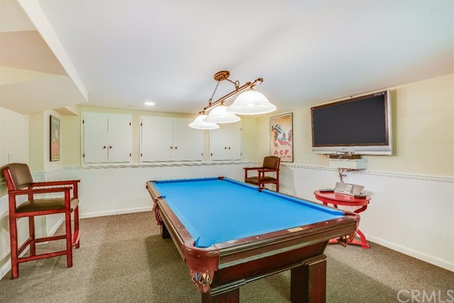 167 Cedar Circle Lake Arrowhead, CA 92352 - Photo 21 of 38 a room with furniture and a flat screen tv