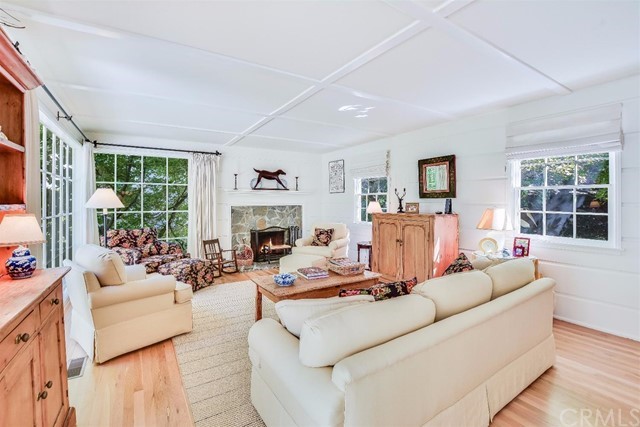 167 Cedar Circle Lake Arrowhead, CA 92352 - Photo 5 of 38 a living room with furniture a fireplace and a large window