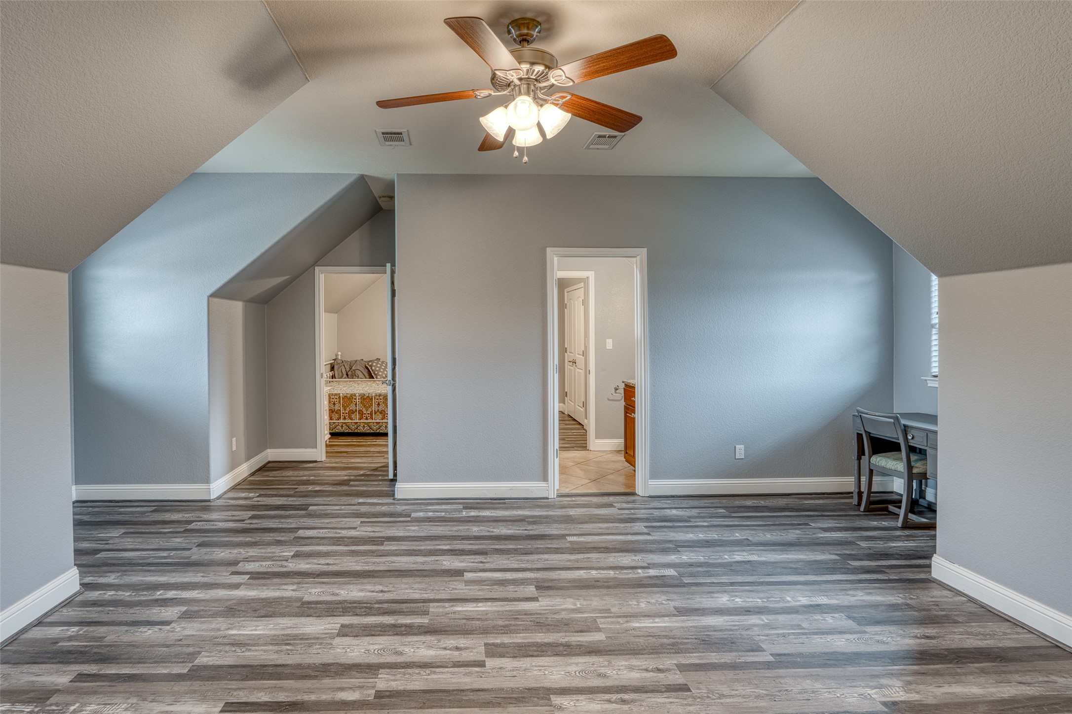 114 Preston Trail Meadowlakes, TX 78654 - Photo 7 of 23 a view of a room with a ceiling fan