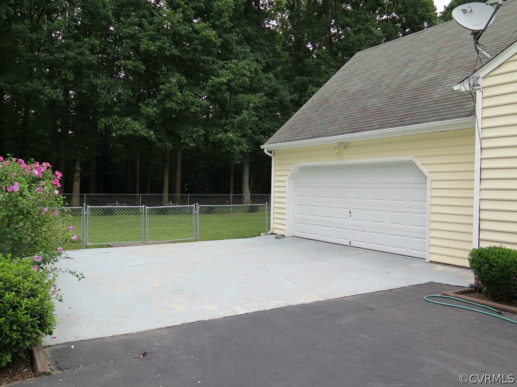 7432 Trailing Rock Road Prince George, VA 23875 - Photo 20 of 24 a view of a backyard