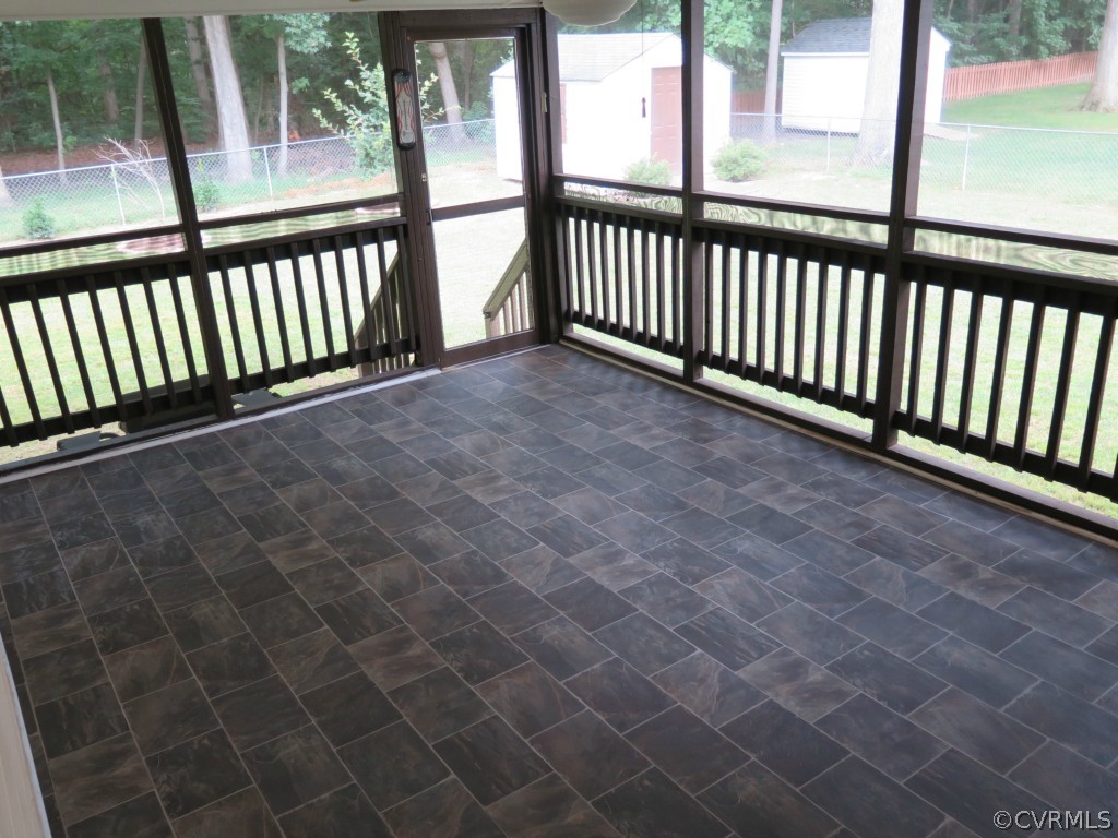 7432 Trailing Rock Road Prince George, VA 23875 - Photo 22 of 24 a view of a balcony with a floor to ceiling window