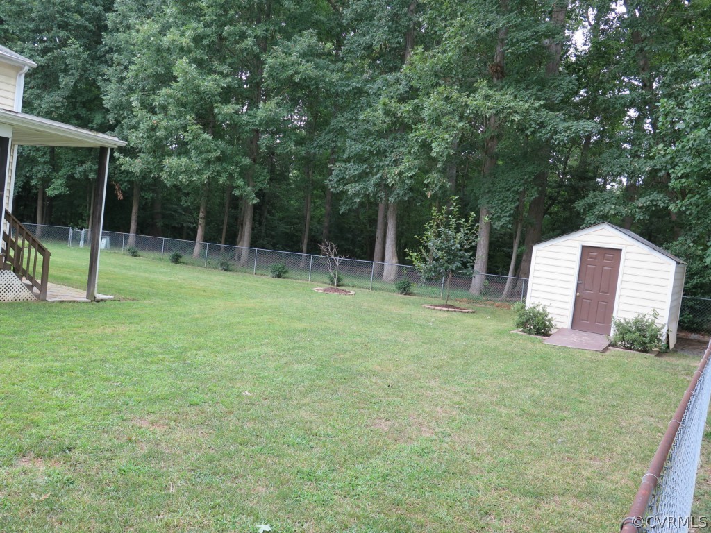 7432 Trailing Rock Road Prince George, VA 23875 - Photo 24 of 24 a view of outdoor space with deck and backyard