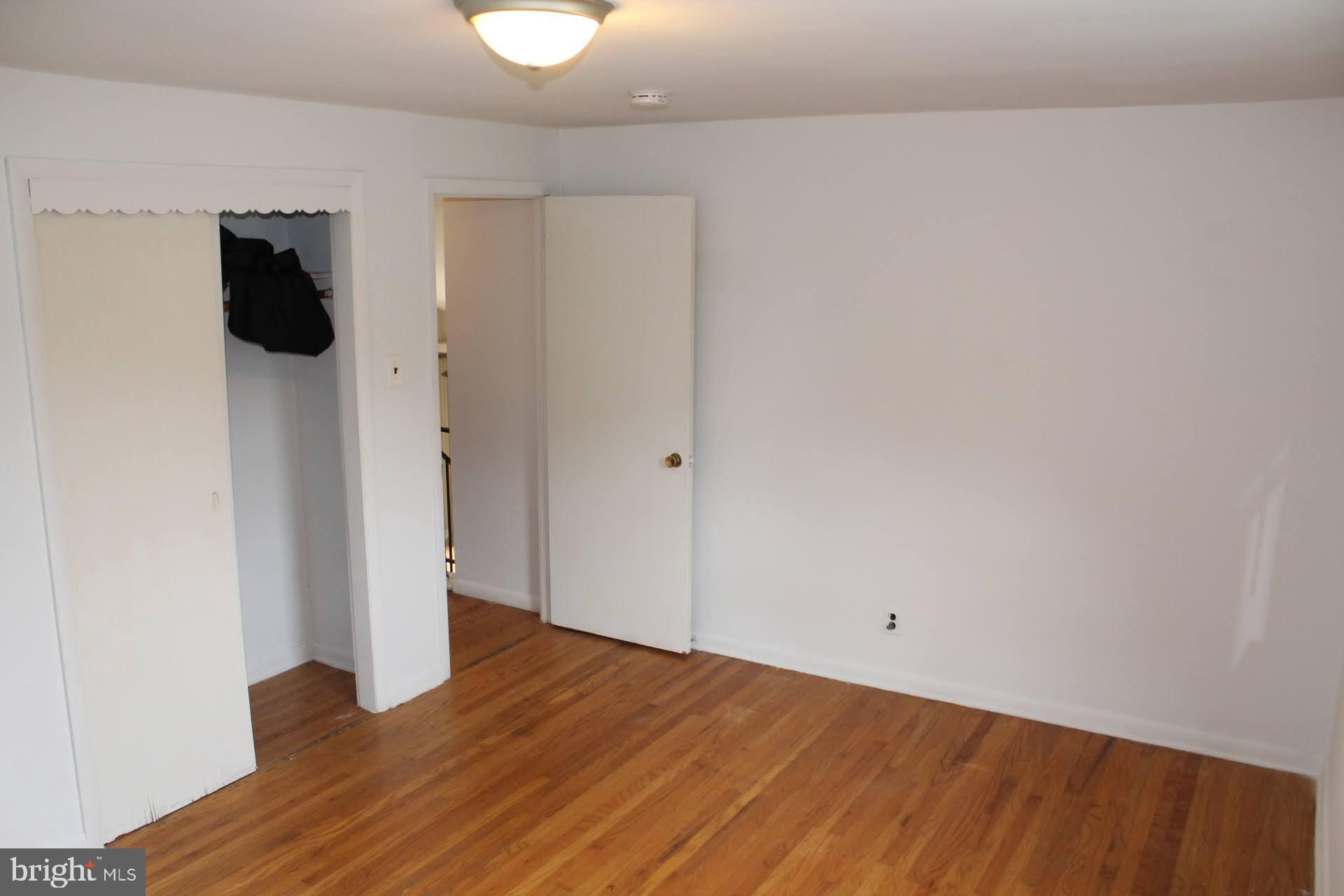 608 Whitman Street Glassboro, NJ 08028 - Photo 7 of 8 a view of a room with wooden floor and a sink