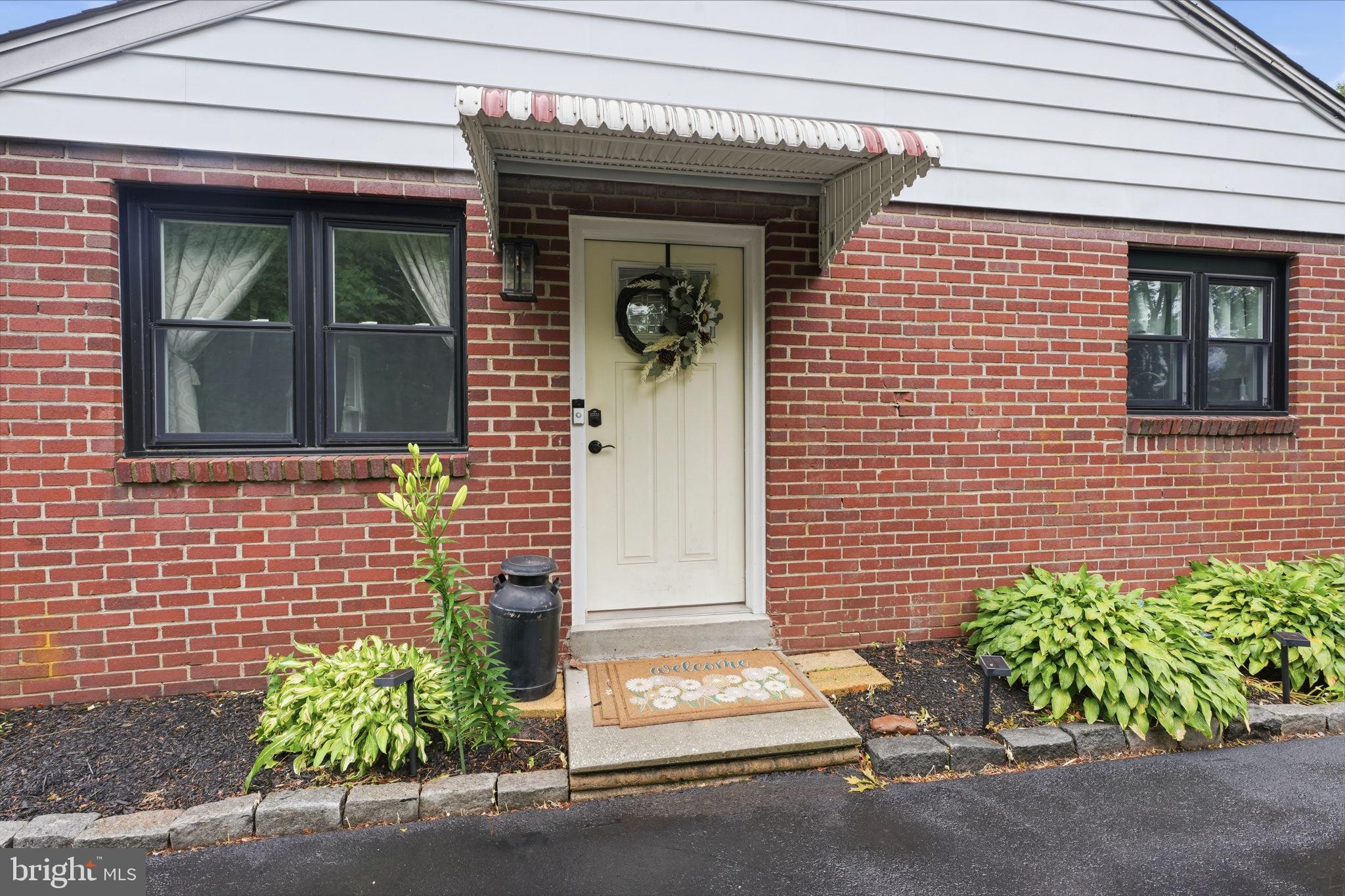20 Poplar Road Ringoes, NJ 08551 - Photo 5 of 44 Charming brick facade with welcoming entry.