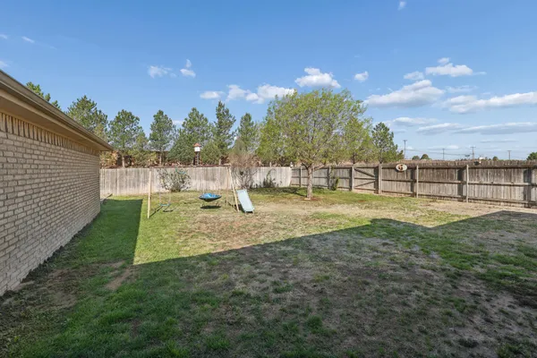 a view of yard with tree s