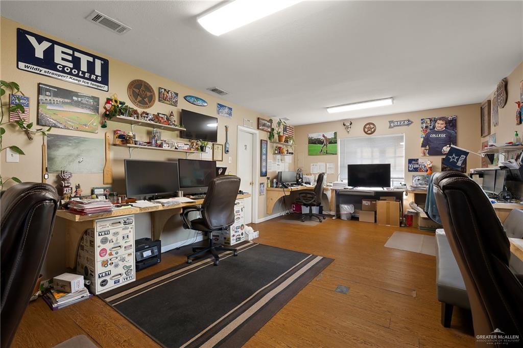 3721 North Veterans Boulevard Pharr, TX 78577 - Photo 11 of 18 Office with visible vents and wood finished floors