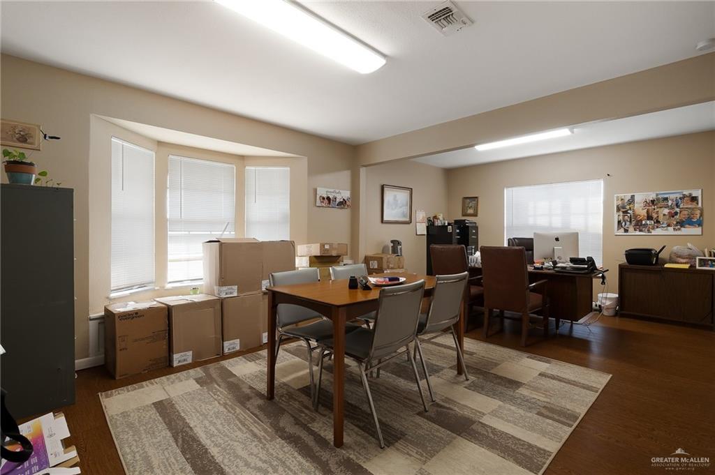 3721 North Veterans Boulevard Pharr, TX 78577 - Photo 13 of 18 Dining room with wood finished floors and visible vents
