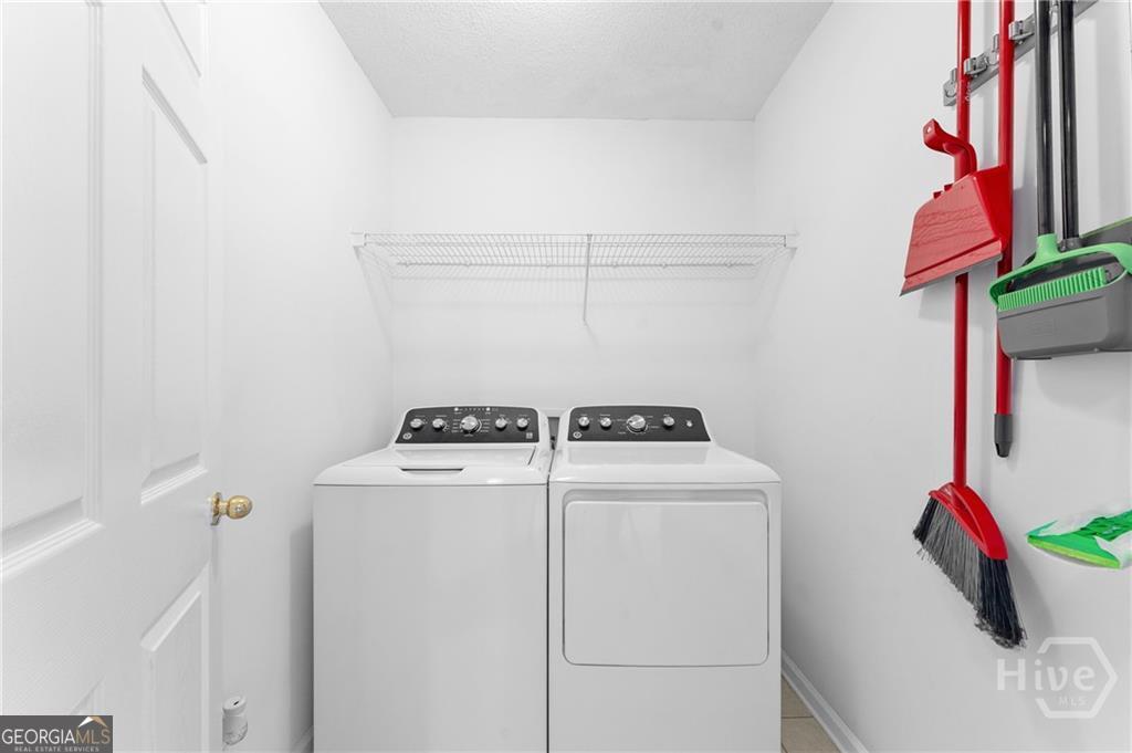 10 Fox Hound Court Pooler, GA 31322 - Photo 26 of 32 a utility room with dryer and washer