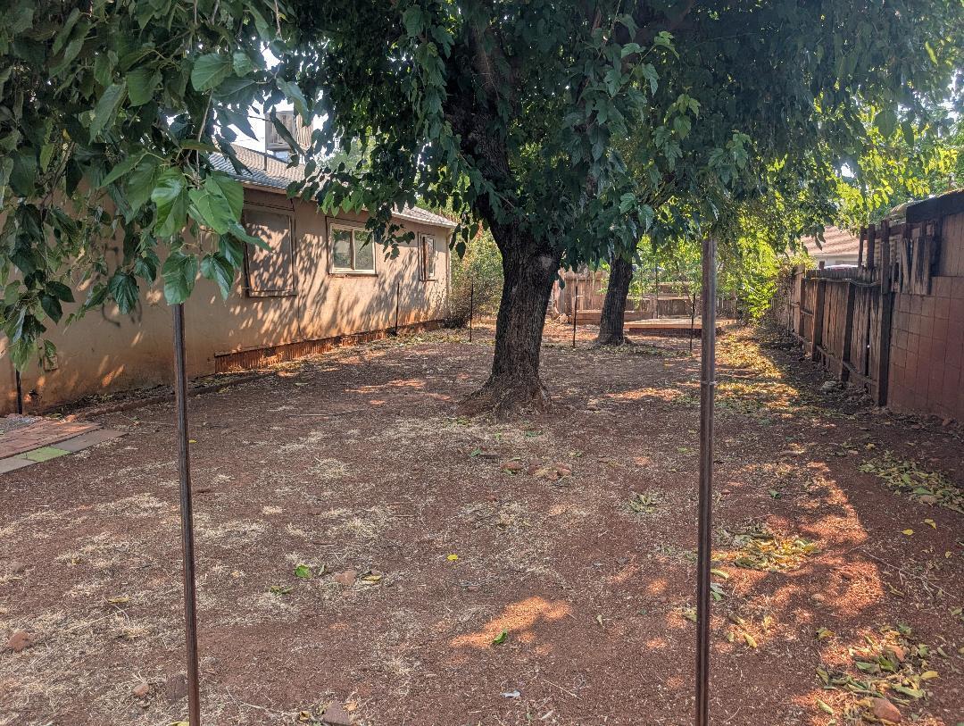 1118 4th Street Redding, CA 96002 - Photo 13 of 16 a view of a house with a tree