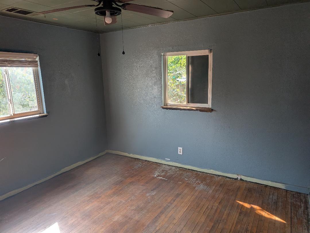 1118 4th Street Redding, CA 96002 - Photo 10 of 16 an empty room with a window