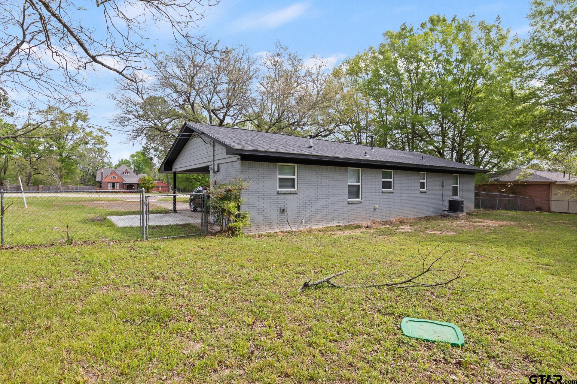 802 Quitman Street Pittsburg, TX 75686 - Photo 22 of 24 a view of outdoor space and yard