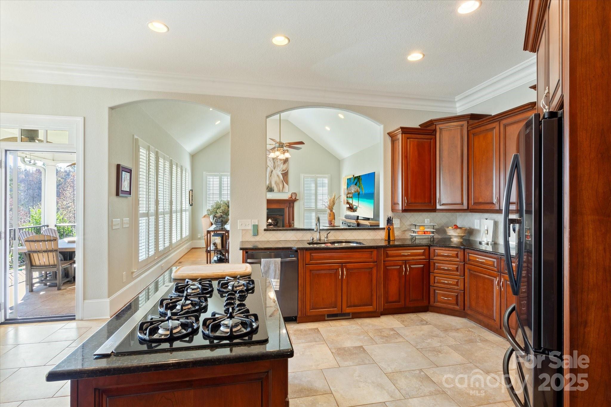 733 Plantation Dr Extension Rutherfordton, NC 28139 - Photo 11 of 34 a large kitchen with stainless steel appliances granite countertop a stove and a sink