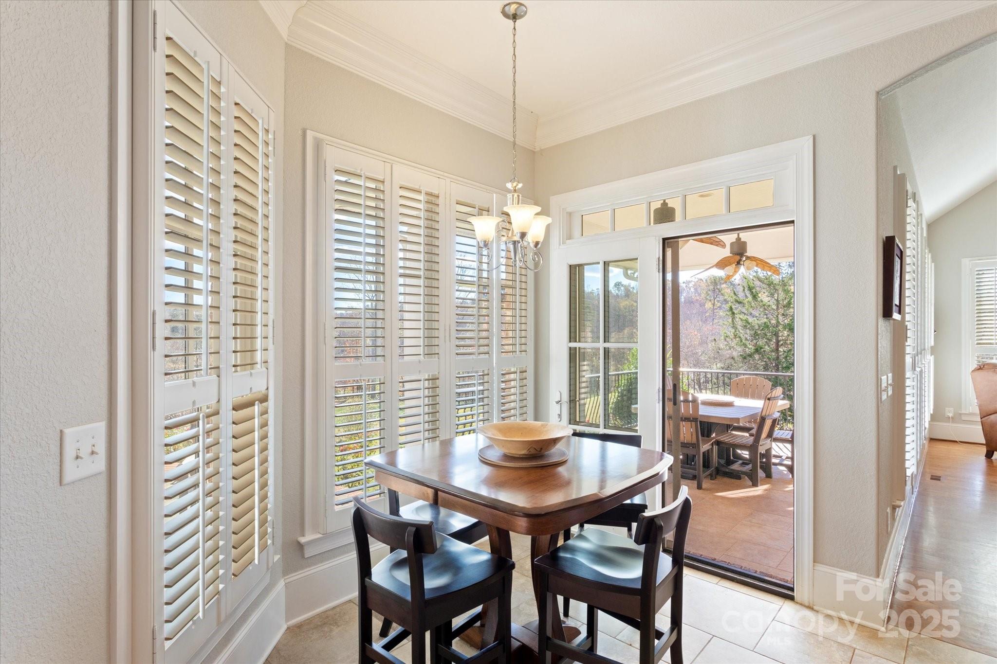 733 Plantation Dr Extension Rutherfordton, NC 28139 - Photo 12 of 34 a view of a dining room with furniture window and outside view