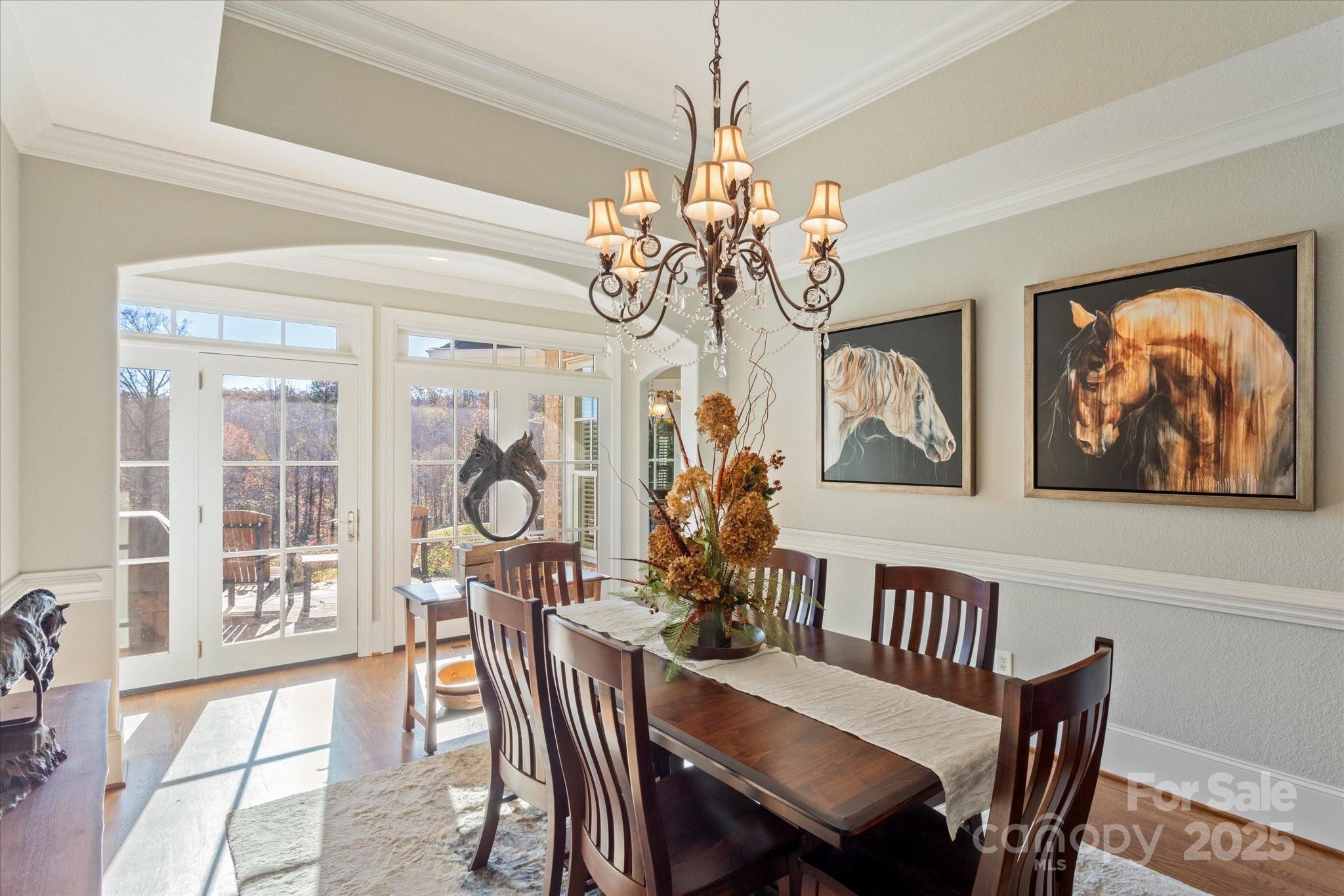 733 Plantation Dr Extension Rutherfordton, NC 28139 - Photo 13 of 34 a view of a dining room with furniture wooden floor and chandelier