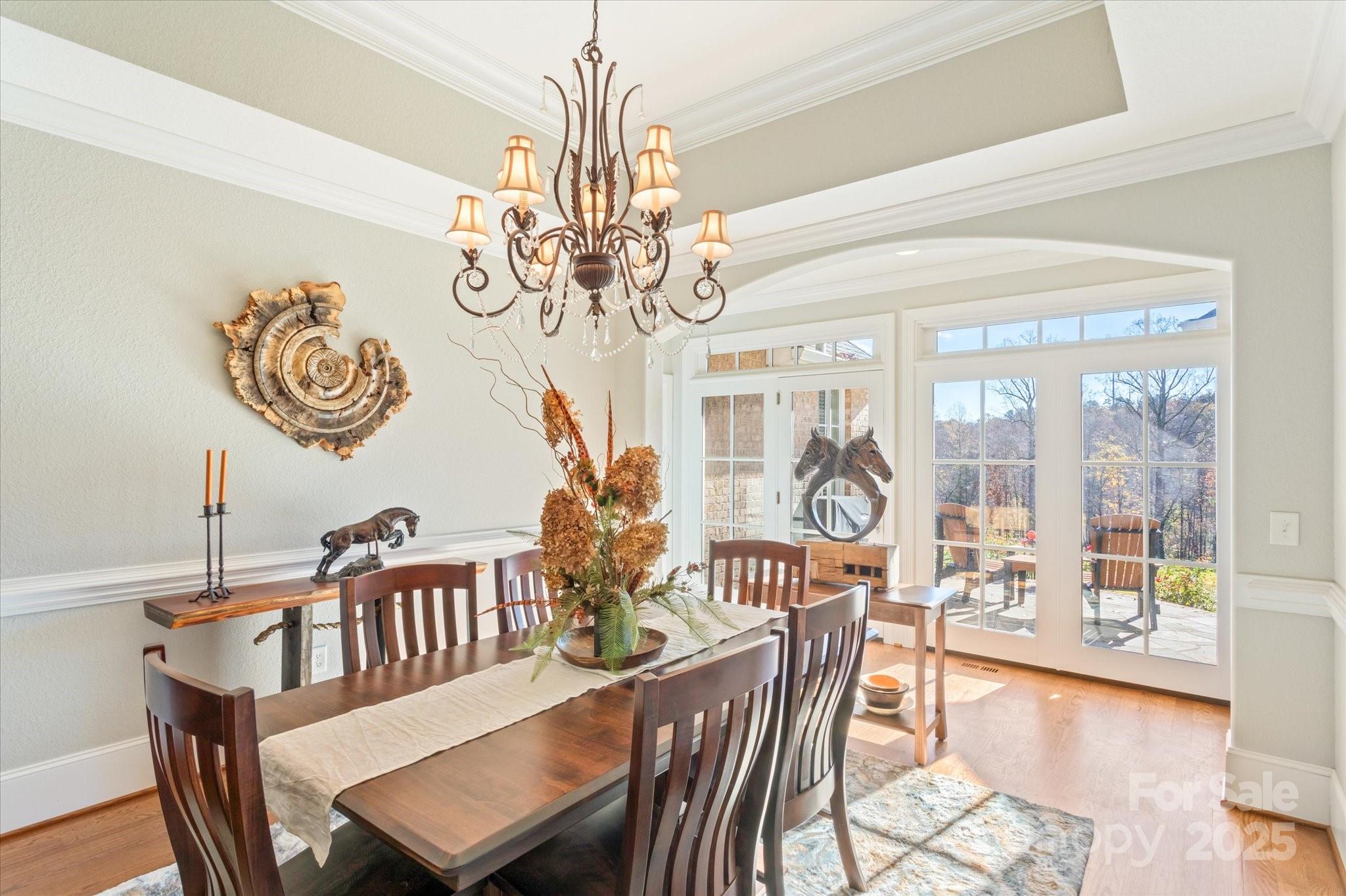 733 Plantation Dr Extension Rutherfordton, NC 28139 - Photo 14 of 34 a view of a dining room with furniture wooden floor and chandelier