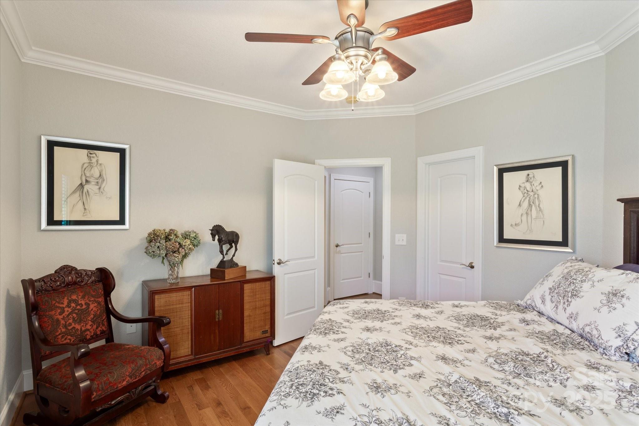 733 Plantation Dr Extension Rutherfordton, NC 28139 - Photo 23 of 34 a bedroom with a bed and wooden floor