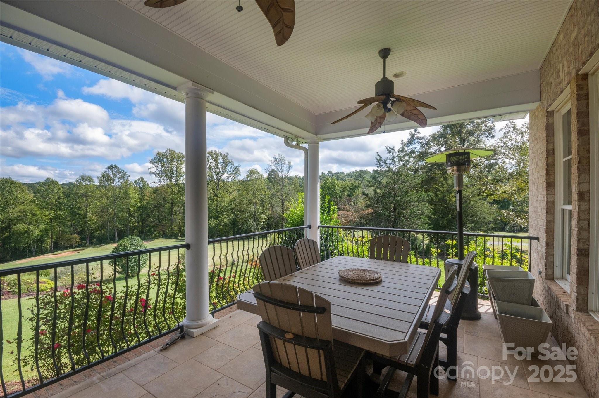 733 Plantation Dr Extension Rutherfordton, NC 28139 - Photo 28 of 34 a view of a patio with a table chairs and a table