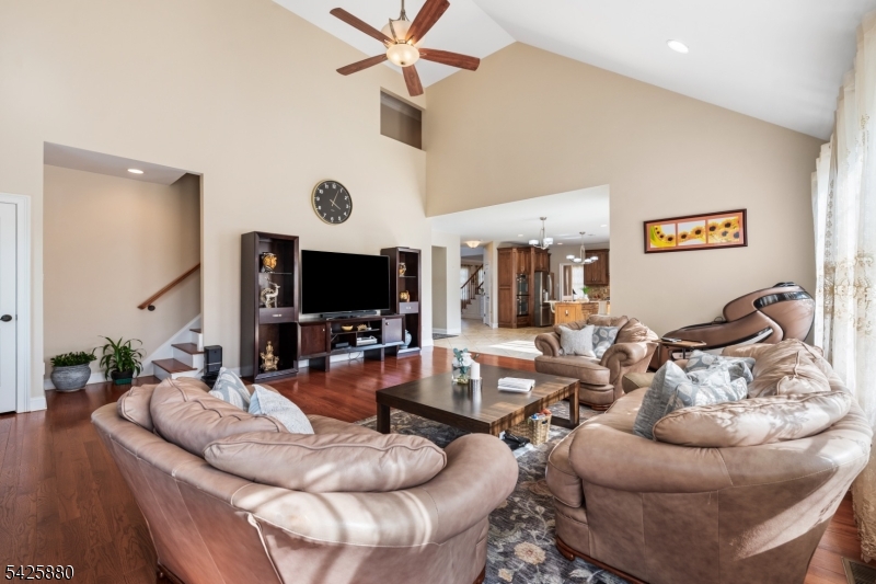 5 Rigger Court Hillsborough, NJ 08844 - Photo 12 of 42 a living room with furniture and a flat screen tv