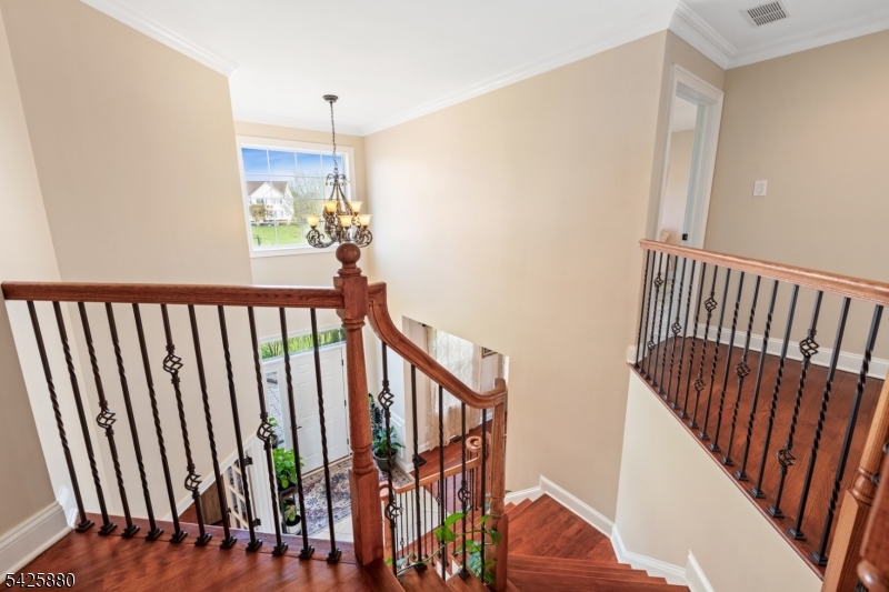 5 Rigger Court Hillsborough, NJ 08844 - Photo 21 of 42 a view of staircase with railing and a rug