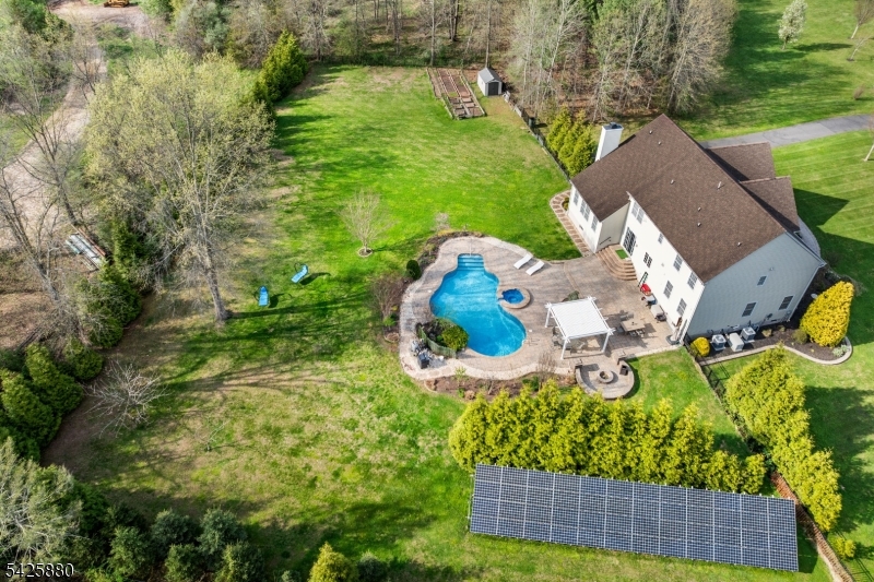 5 Rigger Court Hillsborough, NJ 08844 - Photo 35 of 42 an aerial view of a house with a yard and lake view