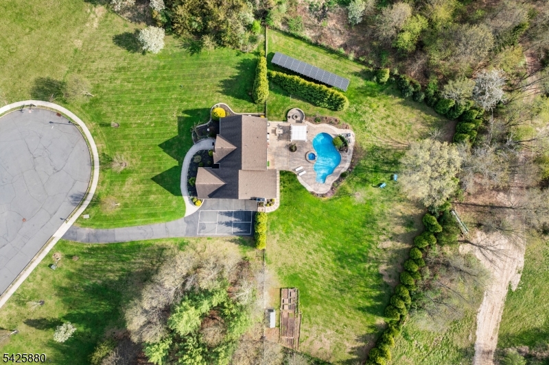 5 Rigger Court Hillsborough, NJ 08844 - Photo 39 of 42 an aerial view of a house with a yard and lake view