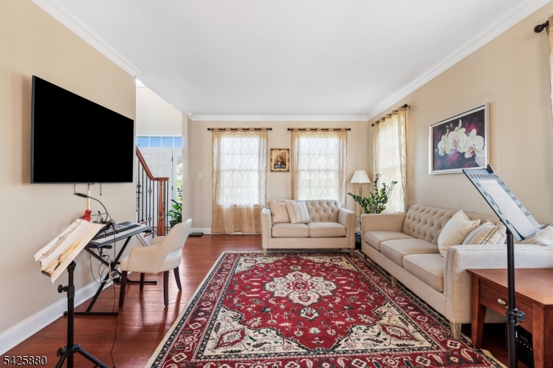 5 Rigger Court Hillsborough, NJ 08844 - Photo 8 of 42 a living room with furniture and a flat screen tv