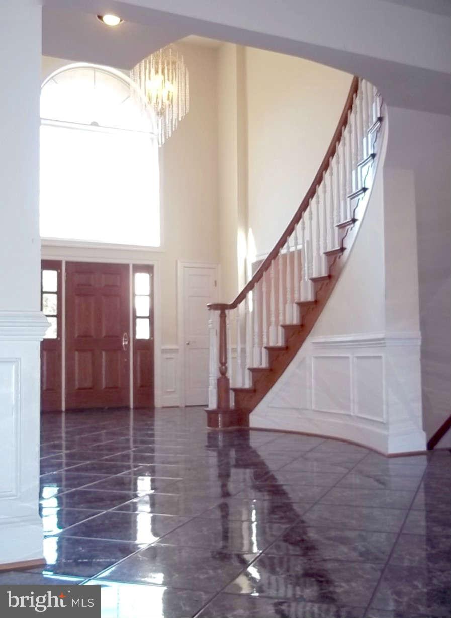 10608 Brooks Reserve Road Upper Marlboro, MD 20772 - Photo 2 of 23 a view of entryway and hall with wooden floor