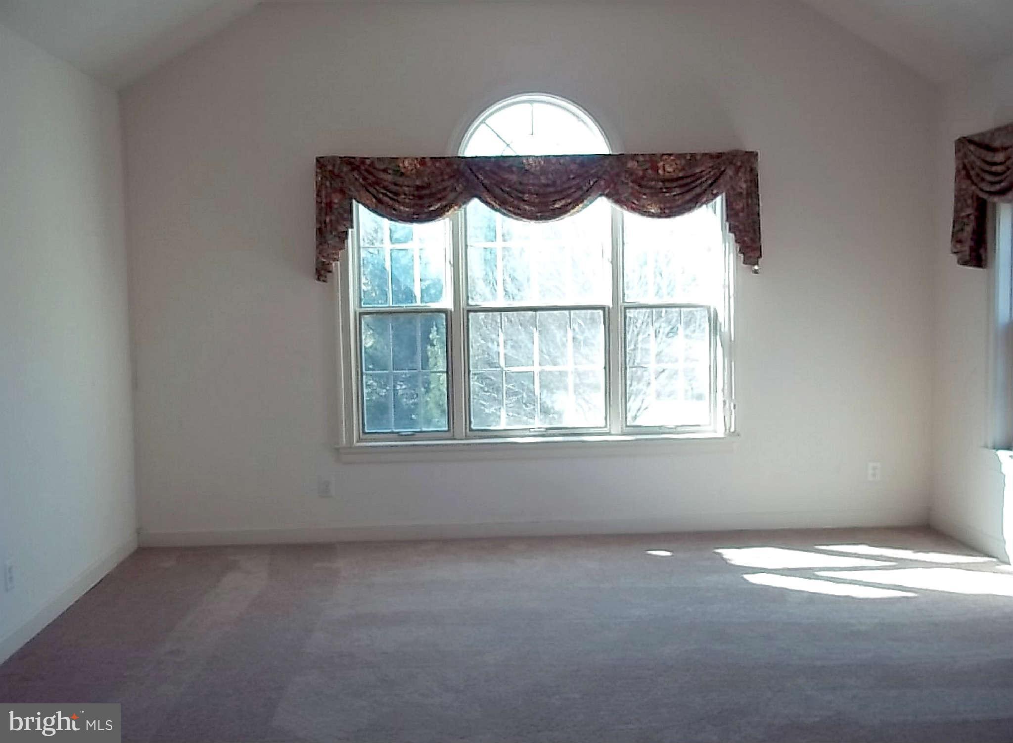 10608 Brooks Reserve Road Upper Marlboro, MD 20772 - Photo 12 of 23 an empty room with a window