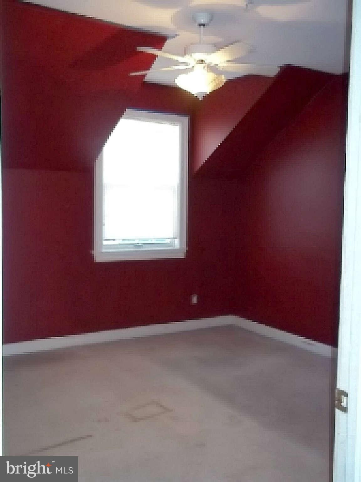 10608 Brooks Reserve Road Upper Marlboro, MD 20772 - Photo 14 of 23 an empty room with a window