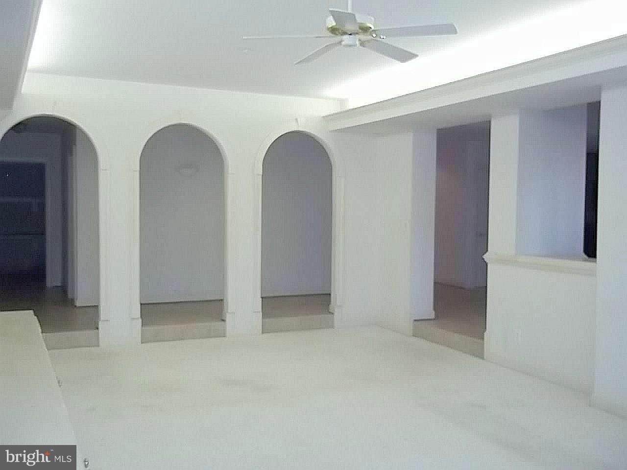 10608 Brooks Reserve Road Upper Marlboro, MD 20772 - Photo 18 of 23 an empty room with windows
