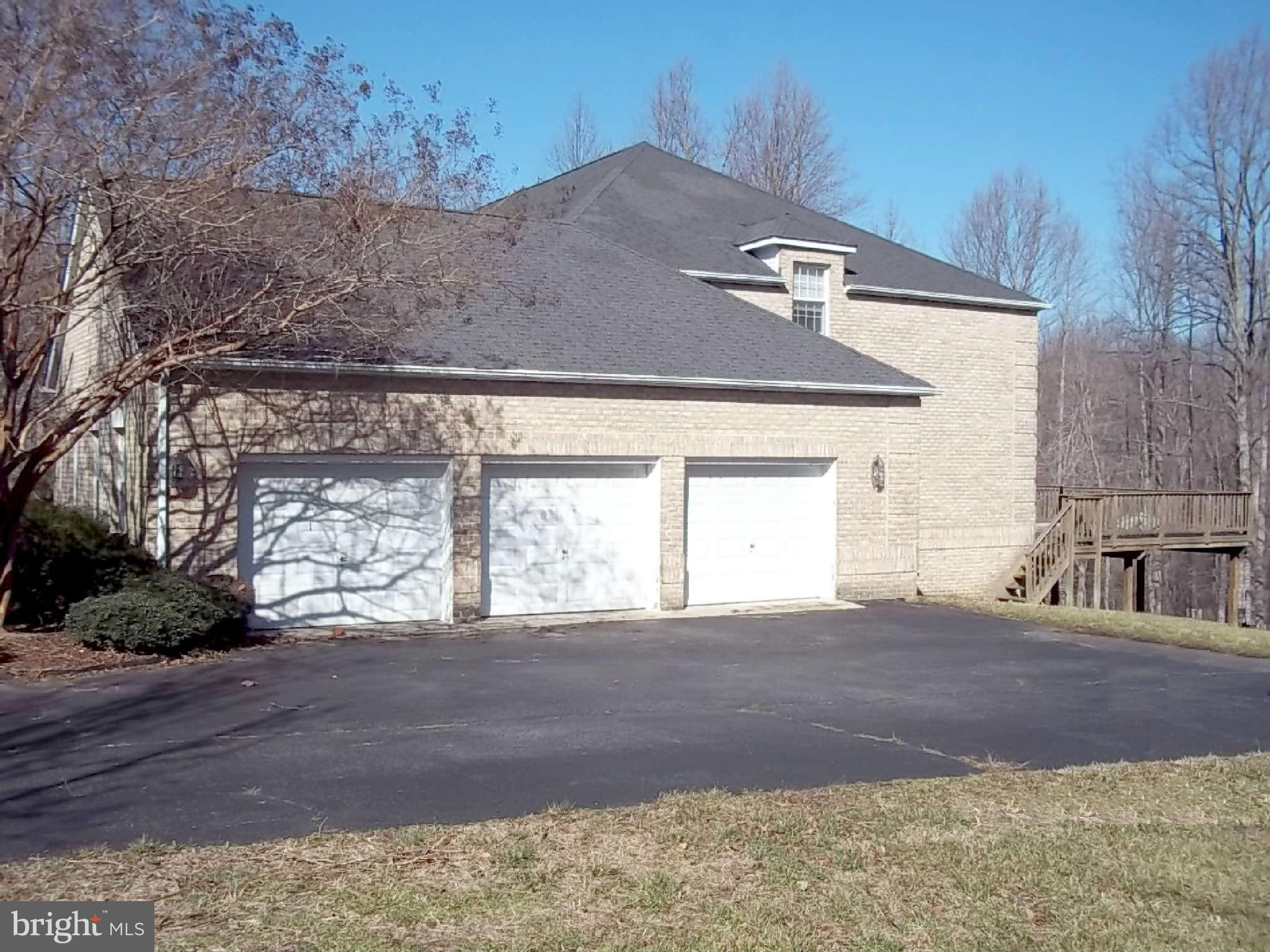 10608 Brooks Reserve Road Upper Marlboro, MD 20772 - Photo 22 of 23 a front view of a house with a yard
