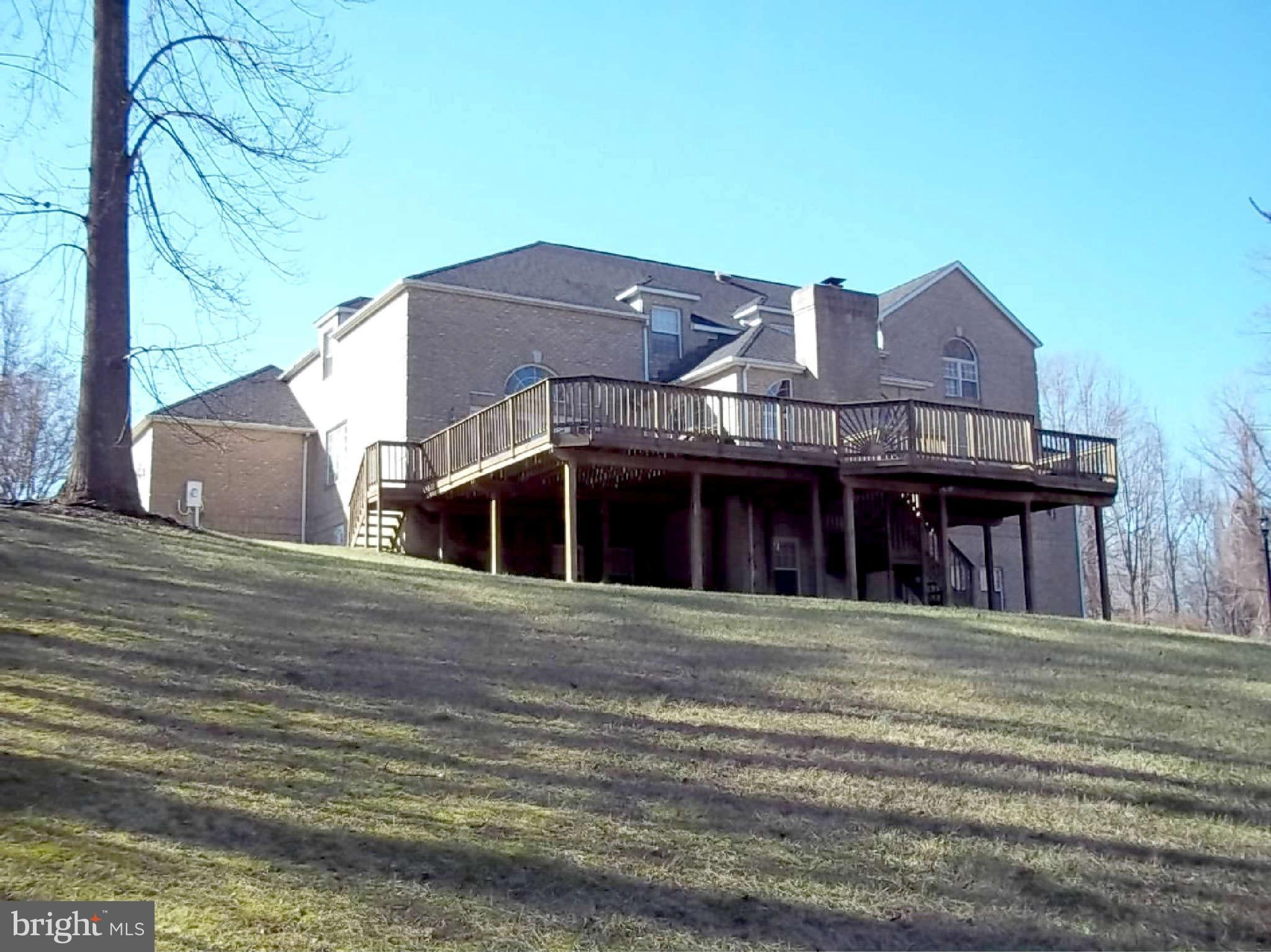 10608 Brooks Reserve Road Upper Marlboro, MD 20772 - Photo 23 of 23 a front view of a house with a garden