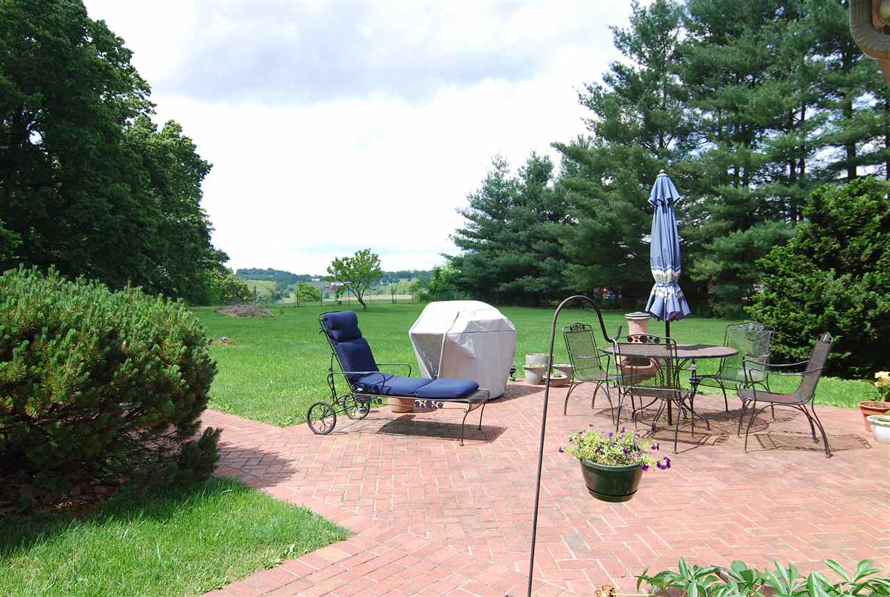 804 Cattle Scales Road Waynesboro, VA 22980 - Photo 6 of 33 a view of a table and chairs in patio