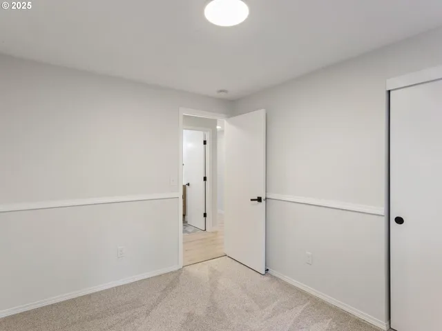 a view of an empty room with empty racks