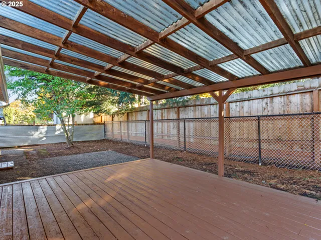 a view of a backyard with a garden and plants